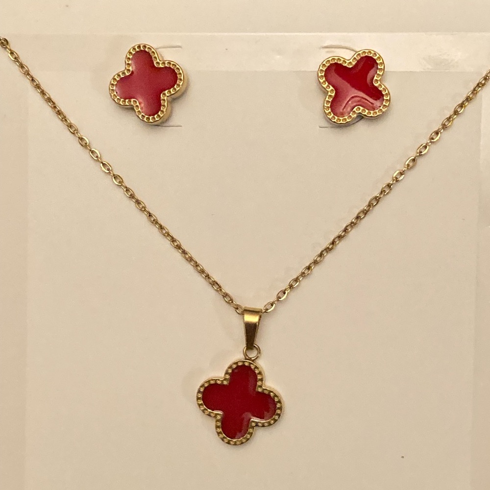 Four leaf clover necklace and earrings set in stainless steel.